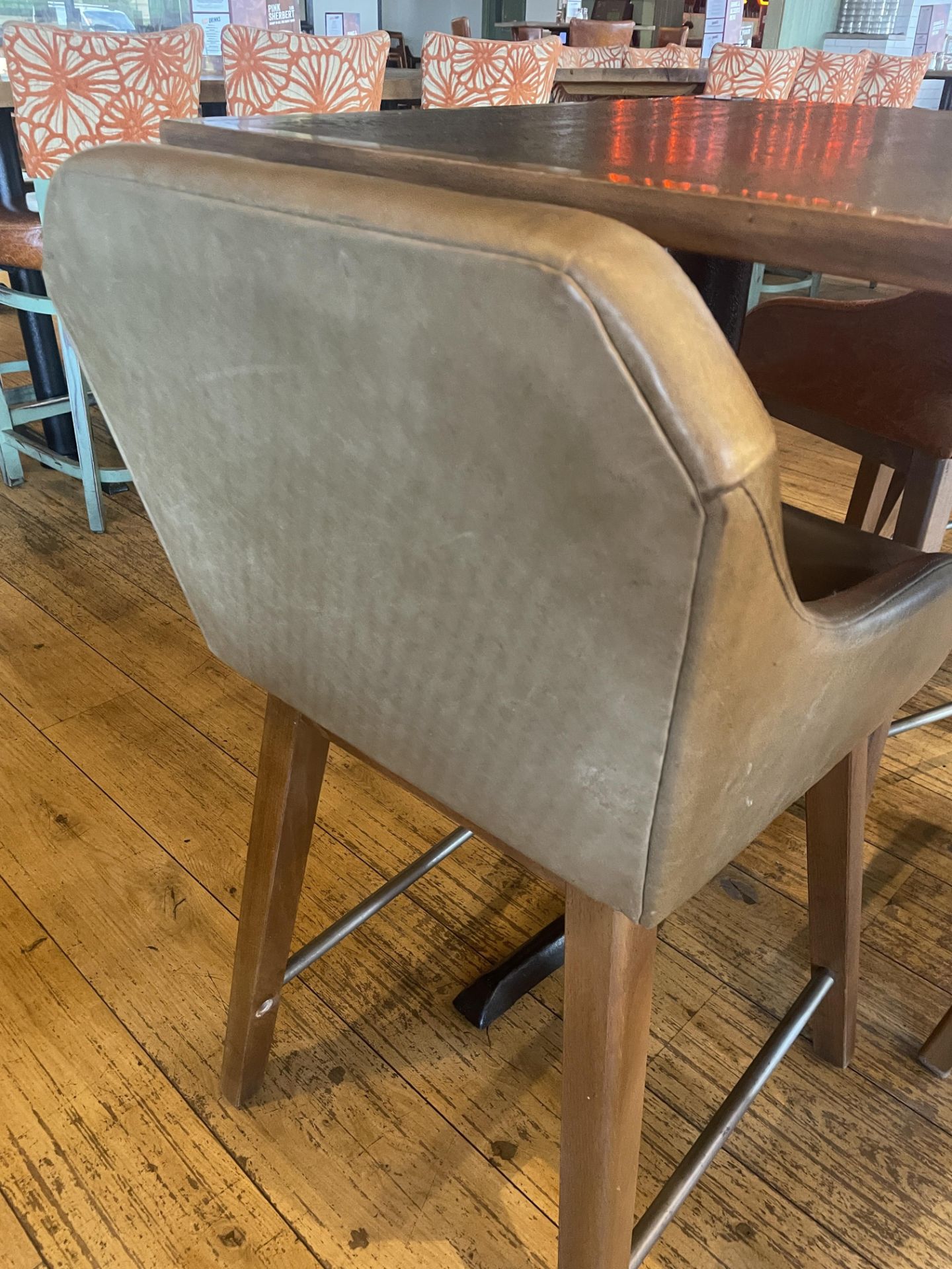 4 x Counter Height Commercial Restaurant Stools Featuring Padded Seats With Sloping Armrests,