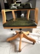 1 x VINTAGE 1970's Padded Captains Chair In Green Leather And Solid Wood Legs On Wheels