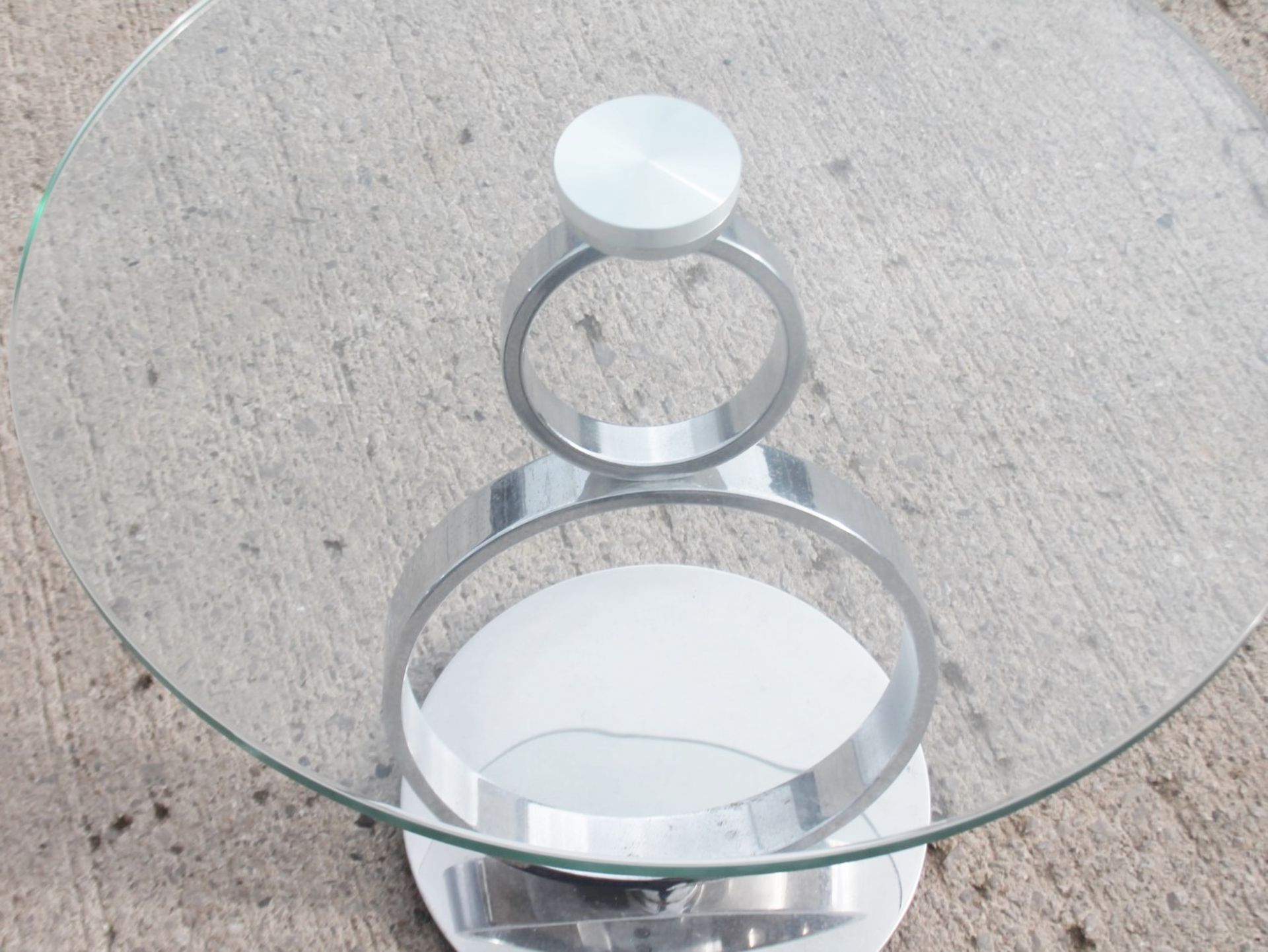1 x Small Circular Glass / Chrome Table With A Slanted Base - Recently Relocated From An Exclusive - Image 4 of 5