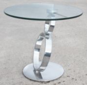 1 x Small Circular Glass / Chrome Table With A Slanted Base - Recently Relocated From An Exclusive