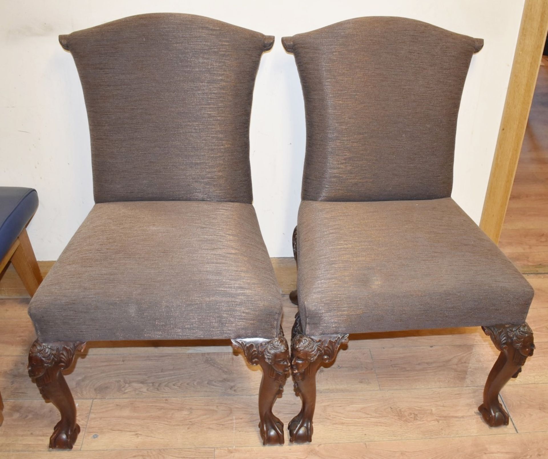 2 x Opulent Dining Chairs Featuring Premium Upholstery, and Ornate Carved Legs with Ball and Claw