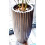 1 x Tall Freestanding Planter With an Abstract Sun Shaped Design