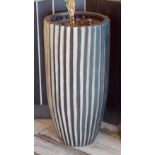 1 x Tall Freestanding Planter With an Abstract Sun Shaped Design