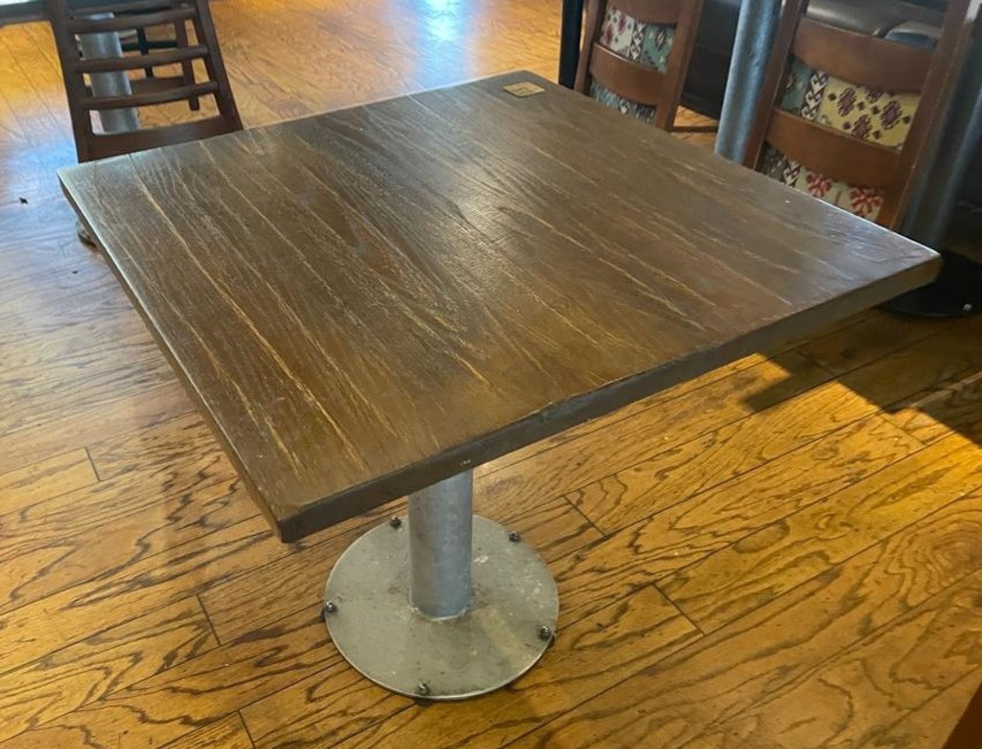 4 x Restaurant Dining Tables Featuring Industrial Pedestal Bases and Wooden Tops - Dimensions: H73.5 - Image 2 of 4