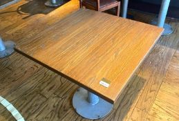 4 x Restaurant Dining Tables Featuring Industrial Pedestal Bases and Wooden Tops - Dimensions: H73.5