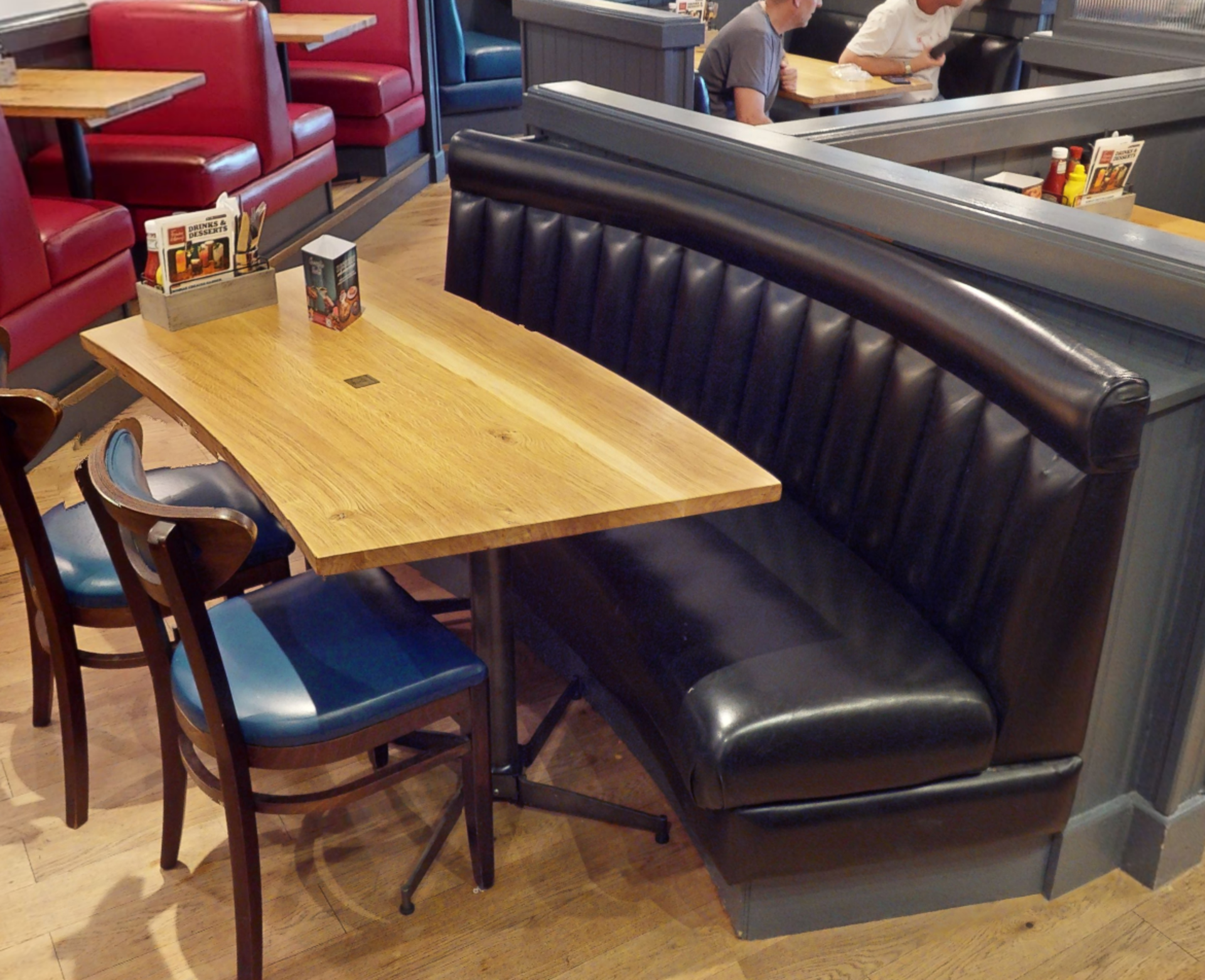 1 x Seating Bench Featuring a Black Faux Leather Upholstery, Ribbed Back and a Curved Solid Oak - Image 2 of 3