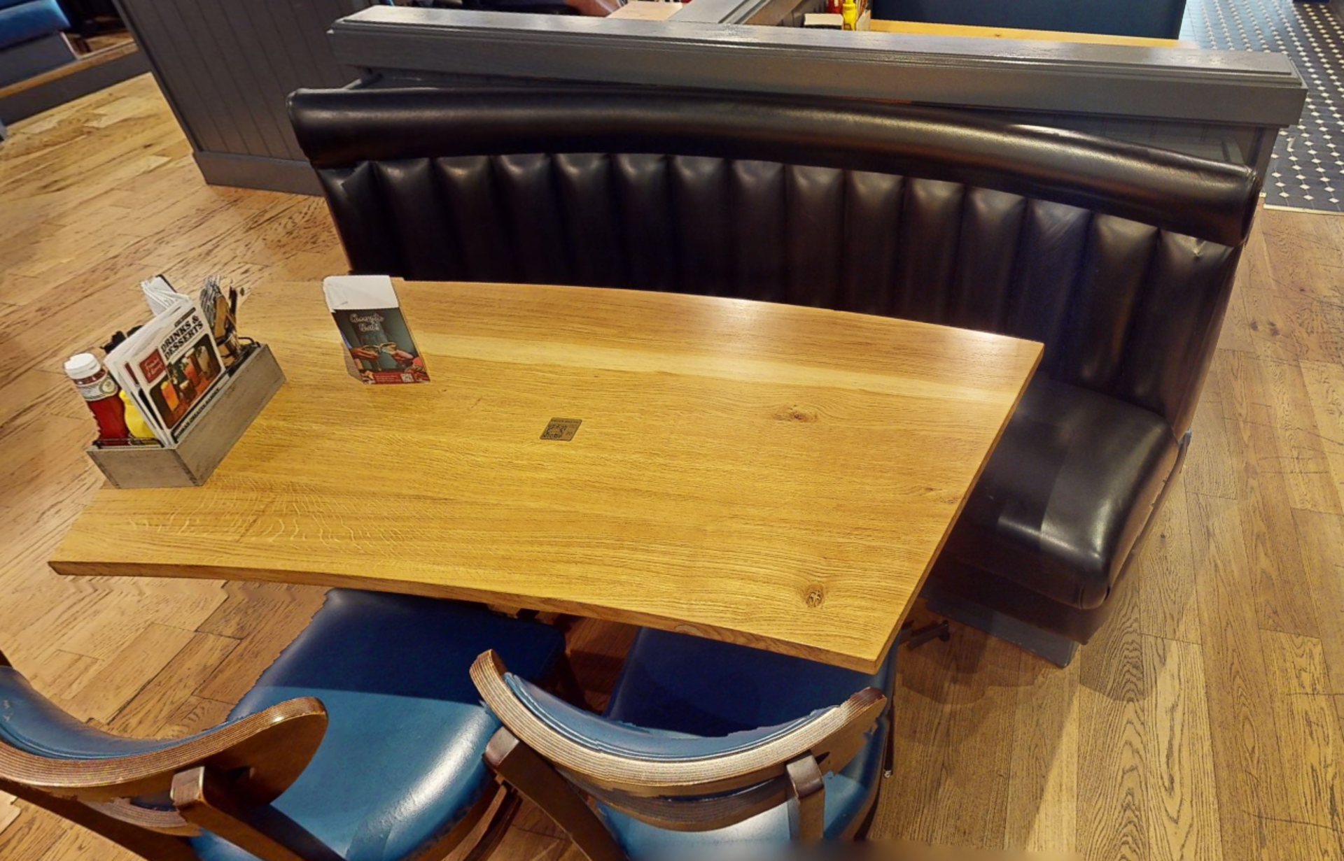 1 x Seating Bench Featuring a Black Faux Leather Upholstery, Ribbed Back and a Curved Solid Oak - Image 3 of 3