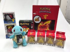 1 x POKEMON Assortment of Toys and Collectibles - Plush Squirtle, Pikachu Radio Alarm Clock and More