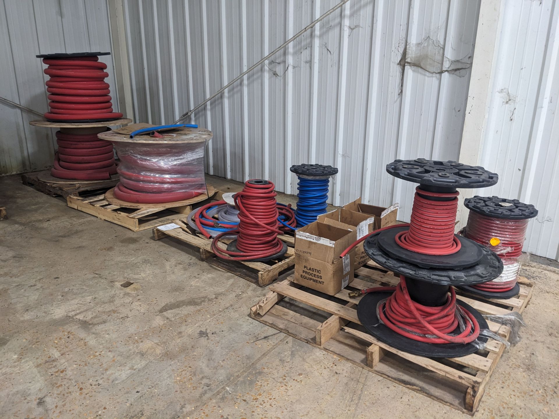Lot of (4) Pallets of Assorted Air and Water Hoses