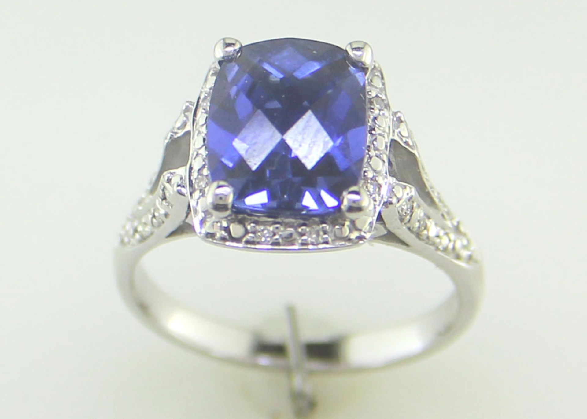 9ct White Gold Cushion Cluster Diamond And Created Ceylon Sapphire Ring - Valued By IDI £3,395. - Image 5 of 10