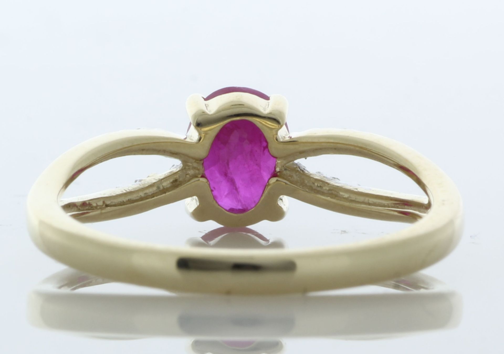 9ct Yellow Gold Diamond And Ruby Ring (R0.81) 0.03 Carats - Valued By IDI £2,505.00 - An oval 8mm - Image 3 of 4