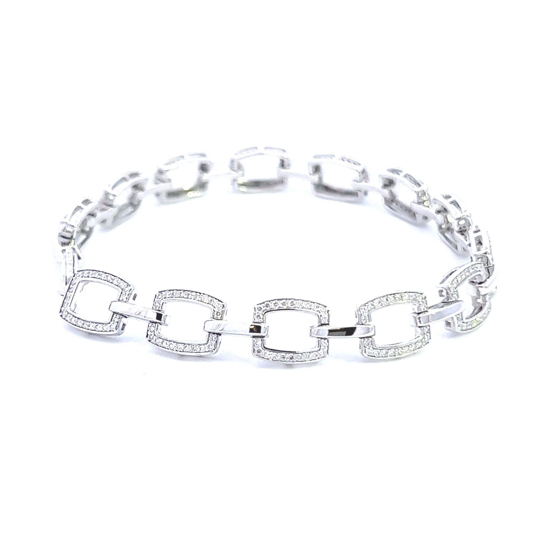 RRP-£6500.00 18K WHITE GOLD LADIES DIAMOND BRRACELET, SET WITH ONE HUNDRED AND EIGHTY SIX ROUND BRIL