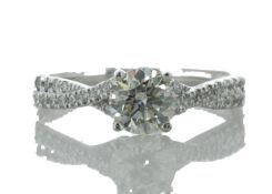 18ct White Gold Single Stone Claw Set With Stone Set Shoulders Diamond Ring (0.71) 0.87 Carats -