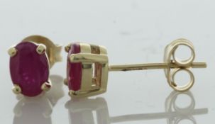 9ct Yellow Gold Ruby Earring (R1.12) - Valued By AGI £1,375.00 - These 9ct yellow gold stud earrings