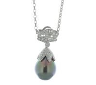 Platinum Ladies Diamond And Pearl Pendant 0.38 Carats - Valued By IDI £9,215.00 - A rare tear-drop