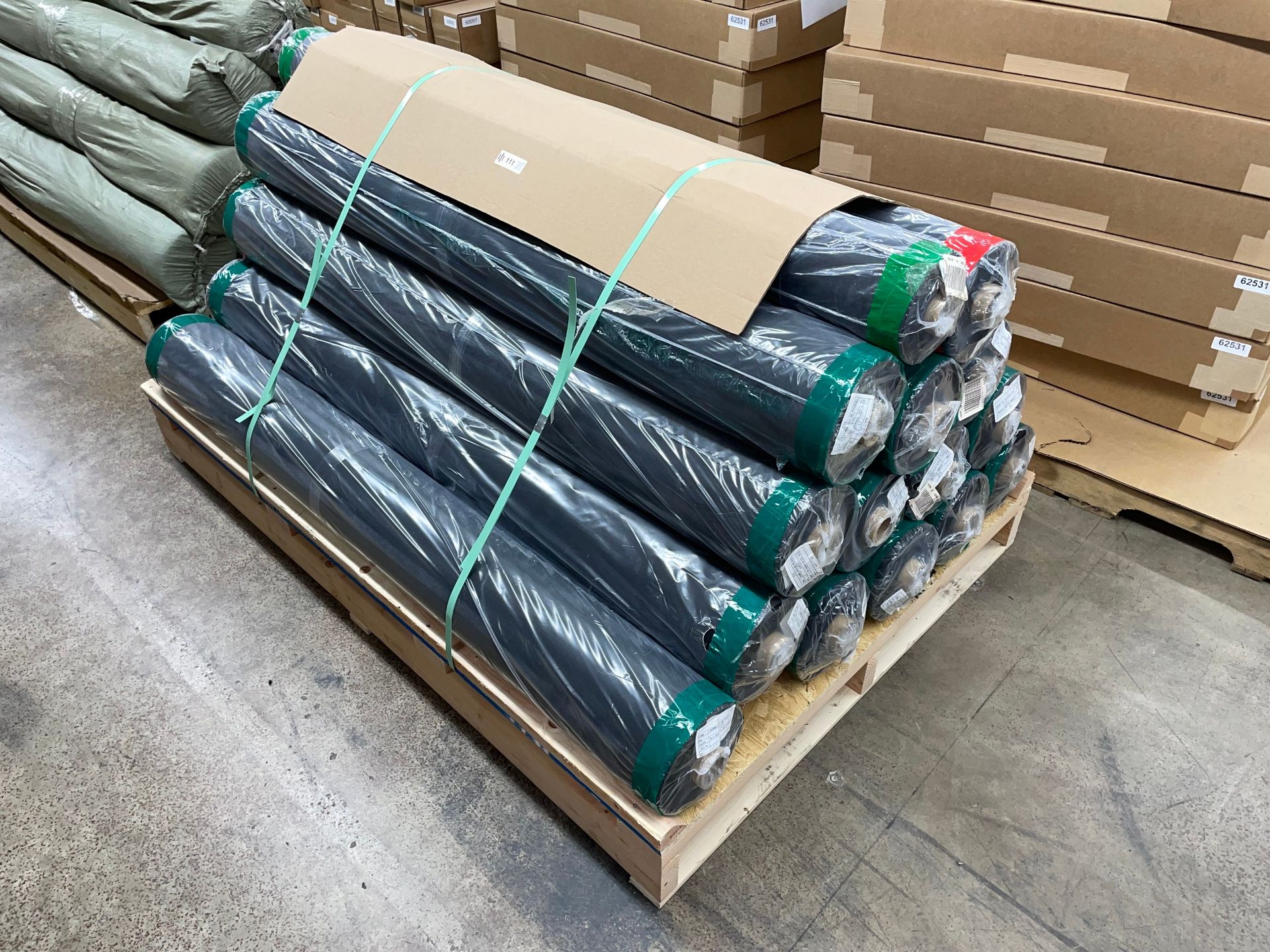 Pallet with (15) Rolls of Material including Poly Black