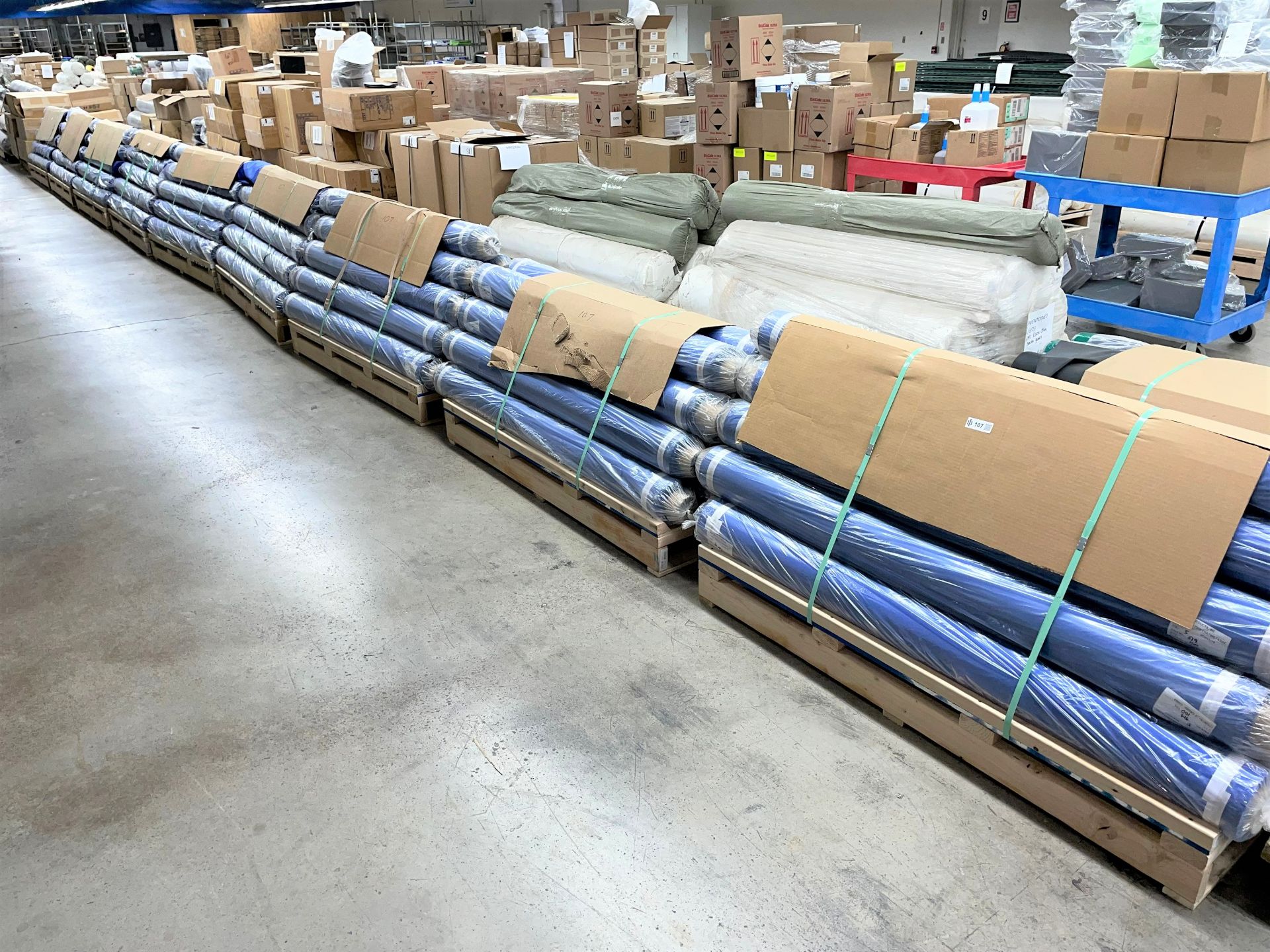 Lot of (9) Pallets with Rolls of Material
