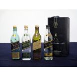 4 empty 20-cl Johnnie Walker Bottles (Gold label, Green label, Black Label and Blue label) in
