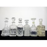 Six various Moulded and Cut Glass Decanters with stoppers - 1 sl chipped