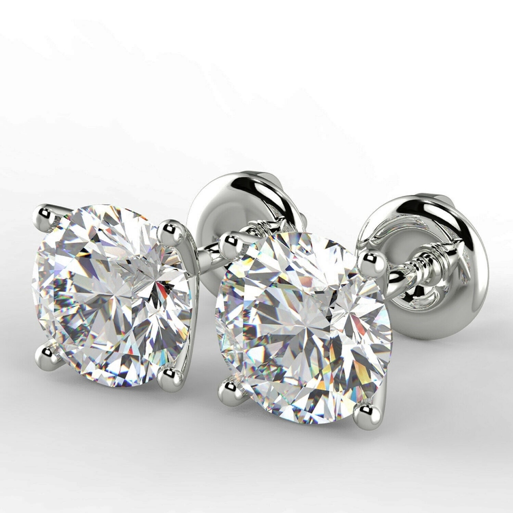 Pair of New 1.56 Carat Round Cut VS2/E Diamond Stud Earrings