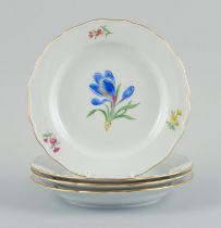 Meissen, Germany. Four Porcelain Plates Hand-painted With Various Floral Motifs And Gold Rim.