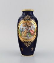 Antique Wien Vase In Hand-painted Porcelain. Classic Motifs And Gold Decoration On A Dark Blue Ba...