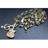 9ct belcher necklace with guitar and treble clef pendant, 51cm long, 4.2g