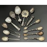 Collection of sterling and white metal (untested) novelty spoons, 7oz approx