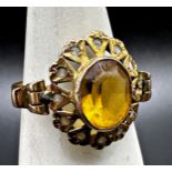 Good quality 9ct citrine and white stone stylised flower head ring, size N, 2.9g (one small stone