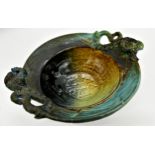 Michael Kennedy pottery twin handled dish, with rams head and fish decoration, 27cm wide