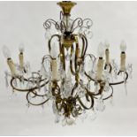 Good continental gilt brass chandelier with eight scrolled branches and sconces and various