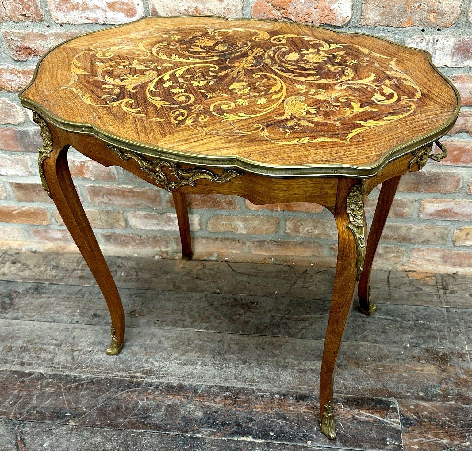 Good late 19th century French inlaid kingwood serpentine centre table, with scrolled floral