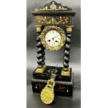 19th century Leroy of Paris boulle work ebonised portico clock, 9.5cm enamel dial, on barley twist