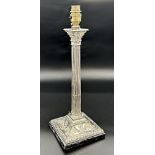 Sheffield plate Corinthian column table lamp embossed with swag decoration, 41cm high