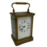 Good quality French brass carriage clock, enamel dial, striking on a gong, 13.5cm high