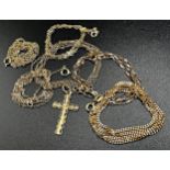 Six fine gold chains, one with crucifix pendant, 8.3g