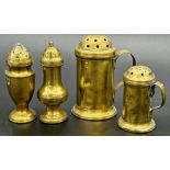 Two similar Georgian brass casters in the form of steins, 11 and 8cm high respectively, with a