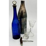 Antique blue glass decanter with mother of pearl stopper inscribed Gin, 34cm high, with white