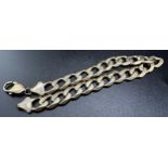 9ct flat curb link bracelet, 23.5cm long, 27.6g