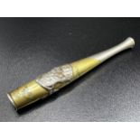 Japanese white and yellow metal cheroot holder or pipe, applied with a tiger and robed figure,