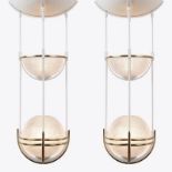 Pair of white metal, brass, Holophane glass Art Deco style lights made for a bar in central