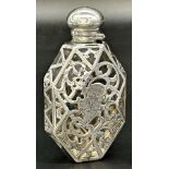 Good quality possibly American pierced silver applied flask, of faceted oval form, 11cm high