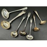 Five Georgian and later silver sauce ladles, to include a good cast threaded example with leopard