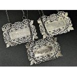 Set of three white metal decanter labels, 'Port', 'Madeira' and 'Lisbon' with pierced grapevine