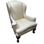 Good Georgian style wingback chair, labelled 'Sinclair Melson ltd, by appointment to her Majesty the