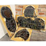 Remarkable possibly medieval sections of leaded stained glass, 58 x 79cm, 59 x 30cm and 35 x 30cm,