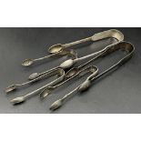 Five pairs of Georgian and later silver sugar tongs, 5.5oz