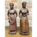 Good antique pair of Dutch folk art lacquered soft wood carvings of a lady in her housekeepers