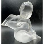 Lalique opaque glass mascot in the form of a seated Cherub, 7.5cm high