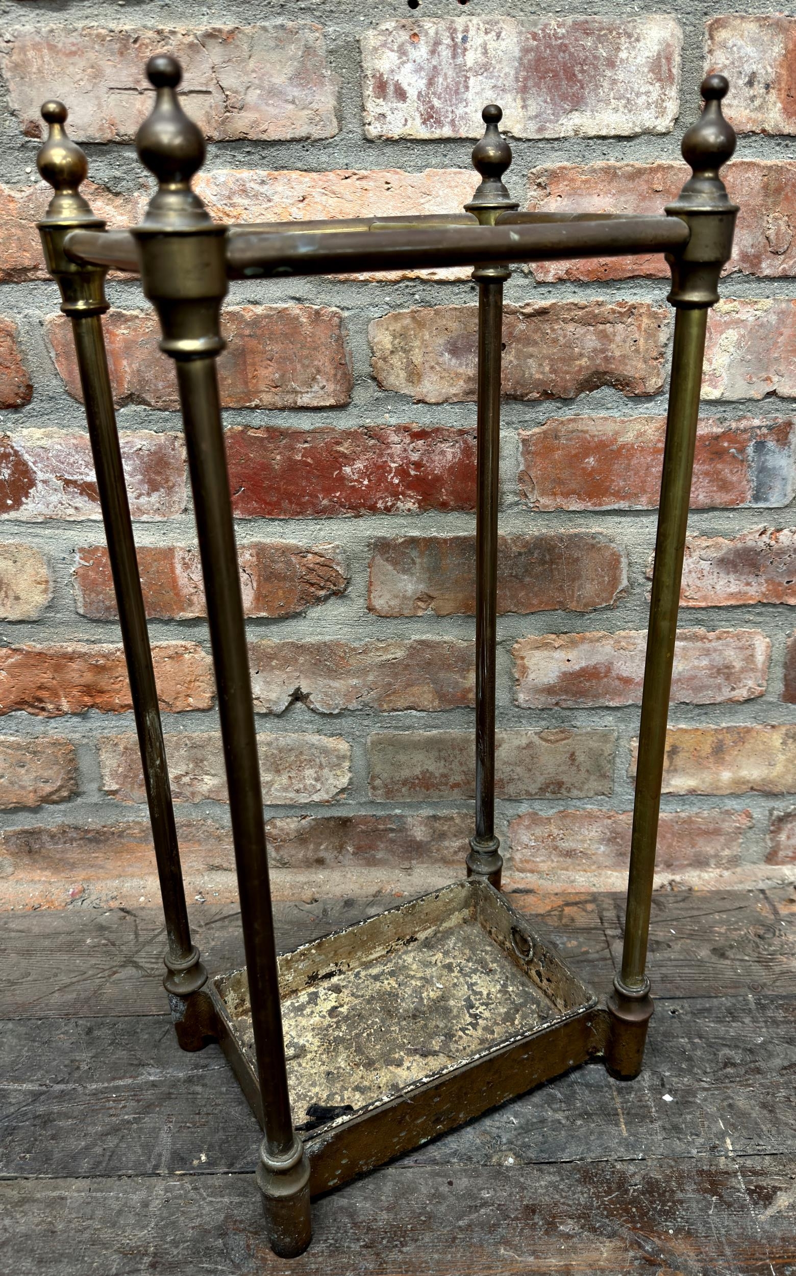 Victorian brass and cast iron six divisional stick stand, 64cm high x 30cm wide x 25cm deep